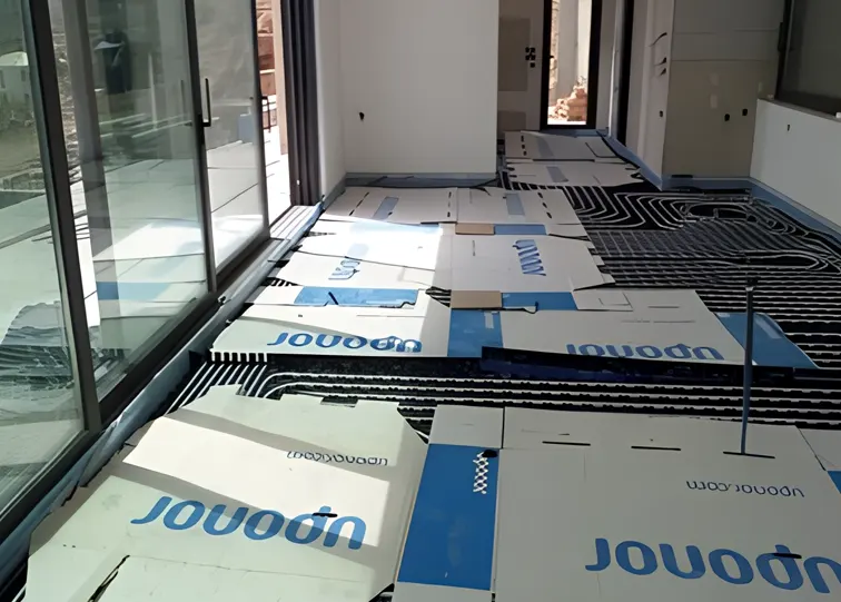 Υλοποίηση ενδοδαπέδιας θέρμανσης σε κατοικία από την Κουρτέσης Water Spa Center